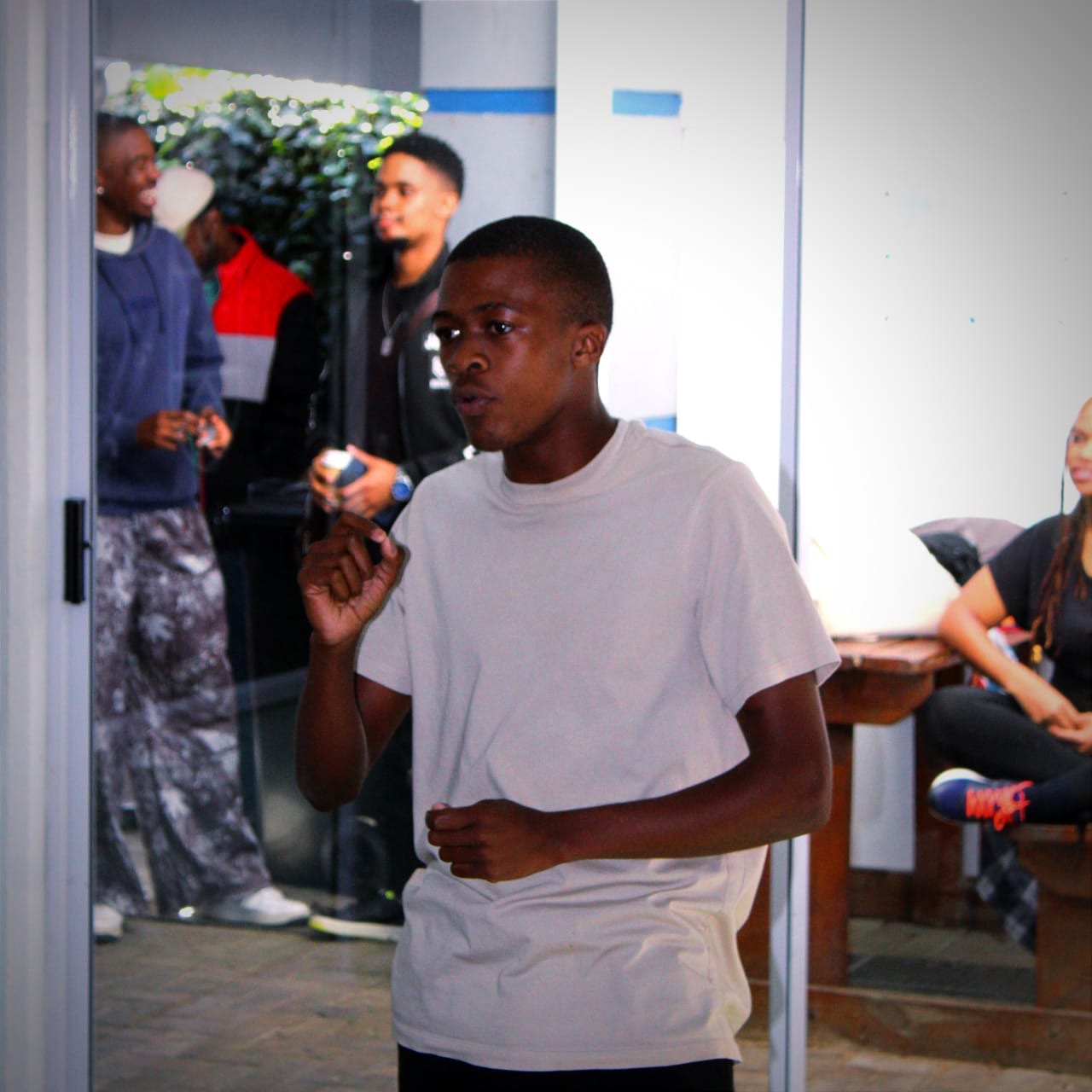 Cwenga Sihle Peter speaking with expressive gestures